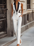 Sleek White Jumpsuit With Dual Button Detail And Black Lapel