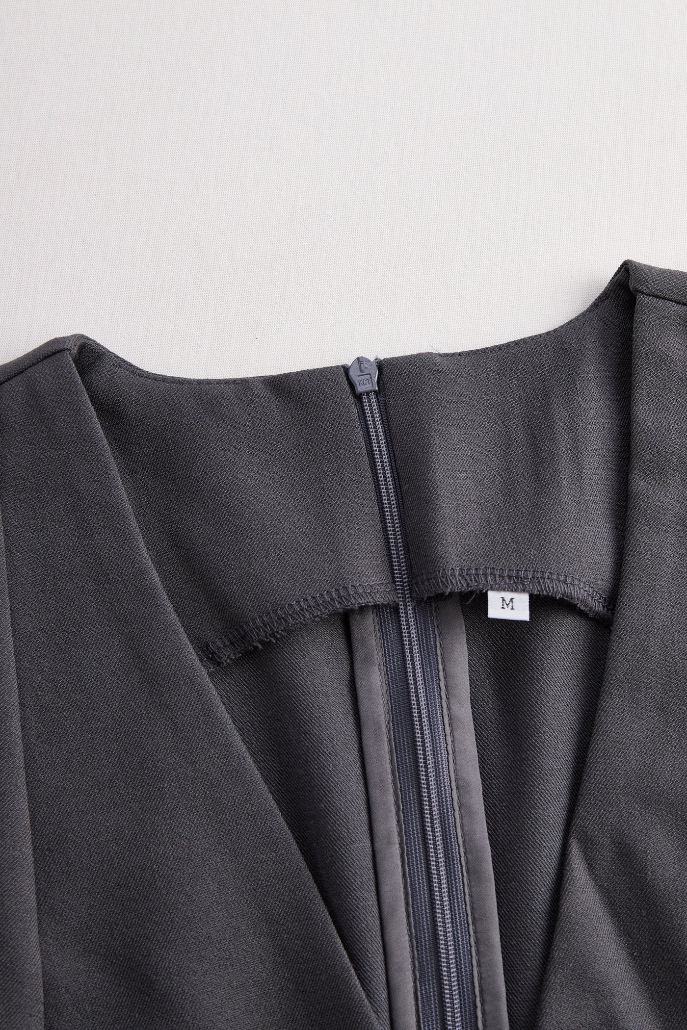 Sophisticated Sleeveless Peplum Jumpsuit In Charcoal Gray