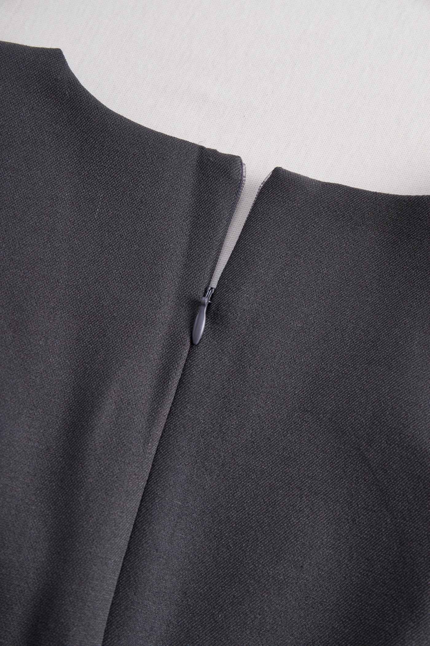 Sophisticated Sleeveless Peplum Jumpsuit In Charcoal Gray